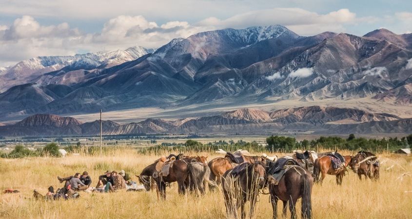 The Mountains of Heaven in Kyrgyzstan serve as stunning background in this photo